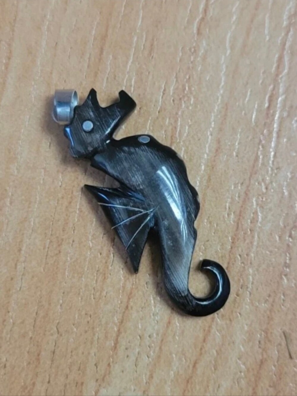 Stone seahorse pendant
